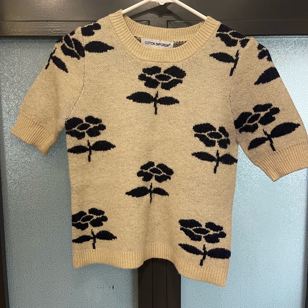 Tan with navy flowers short sleeve sweater.